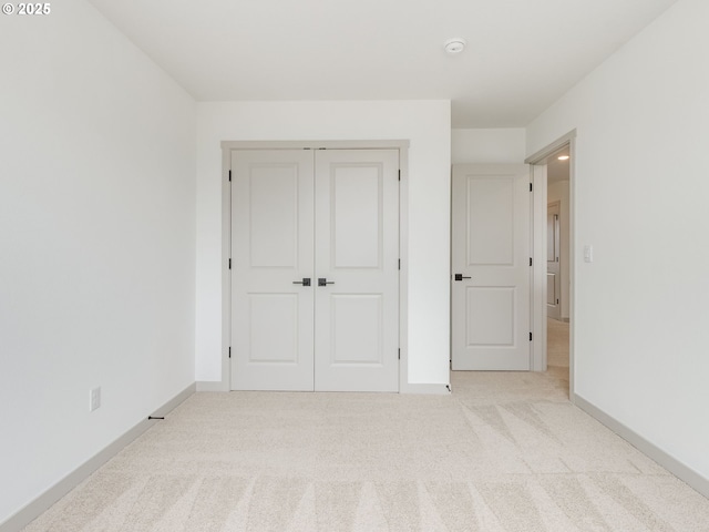 360 NW 29th Way, Battle Ground, WA 98604 - unfurnished bedroom featuring carpet, a closet, and baseboards