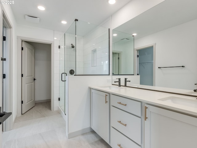360 NW 29th Way, Battle Ground, WA 98604 - bathroom with a shower stall, double vanity, and recessed lighting