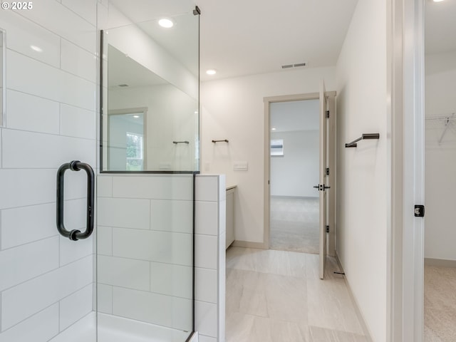 360 NW 29th Way, Battle Ground, WA 98604 - full bath featuring a tile shower, a spacious closet, and recessed lighting