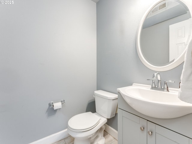 2001 E Evergreen Blvd, Vancouver, WA 98661 - bathroom with toilet, vanity, baseboards, and tile patterned floors