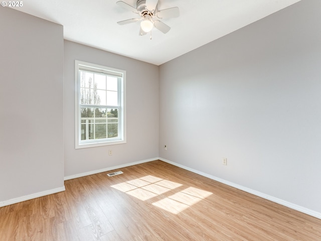 2001 E Evergreen Blvd, Vancouver, WA 98661 - spare room featuring light wood finished floors, baseboards, and a ceiling fan