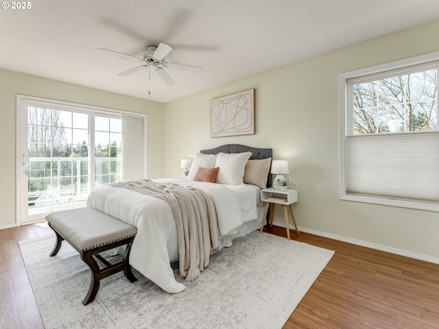 2001 E Evergreen Blvd, Vancouver, WA 98661 - bedroom with multiple windows, access to outside, and wood finished floors