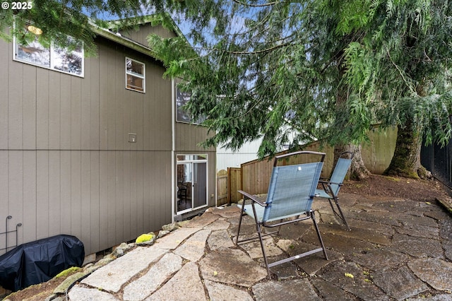 view of patio / terrace featuring fence and outdoor dining space