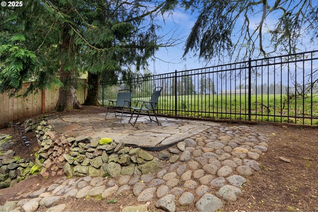 view of patio with fence