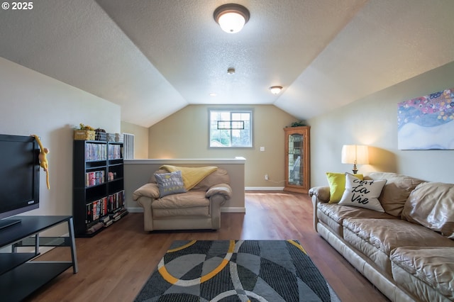 10100 NE 65th Cir, Vancouver, WA 98662 - living room with wood finished floors, a textured ceiling, and vaulted ceiling