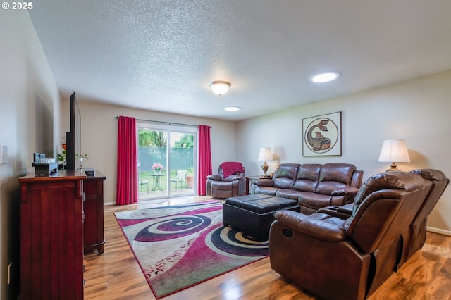 10100 NE 65th Cir, Vancouver, WA 98662 - living room featuring wood finished floors and a textured ceiling