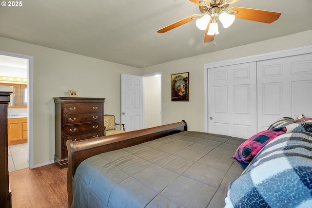 4249 SE 18th Ct, Gresham, OR 97080 - bedroom with light wood-type flooring, a closet, a ceiling fan, and connected bathroom