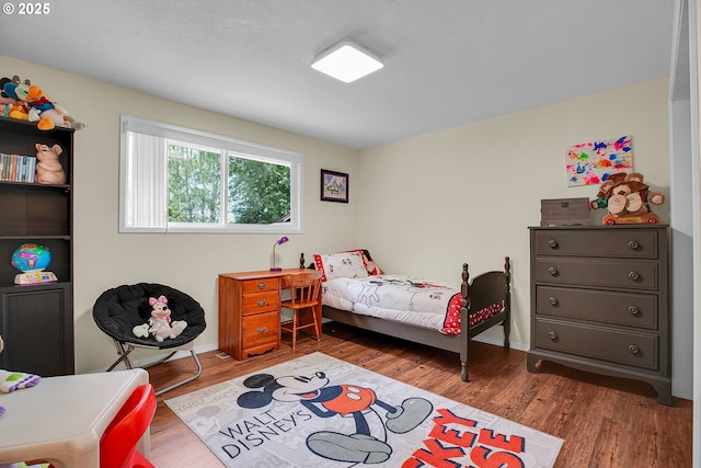 4249 SE 18th Ct, Gresham, OR 97080 - bedroom featuring wood finished floors and baseboards
