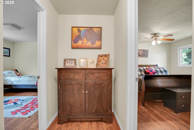 4249 SE 18th Ct, Gresham, OR 97080 - hallway featuring light wood-type flooring and a textured ceiling