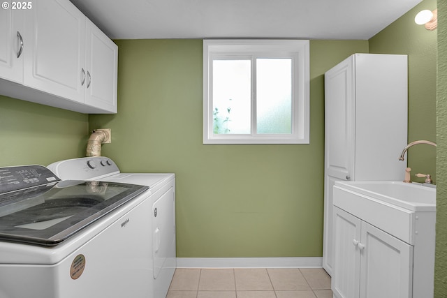 4249 SE 18th Ct, Gresham, OR 97080 - laundry area with washing machine and dryer, cabinet space, and light tile patterned floors