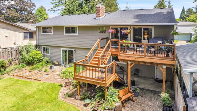 4249 SE 18th Ct, Gresham, OR 97080 - back of property with a deck, a chimney, roof with shingles, and stairs