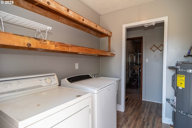 5310 Green Valley Rd, Oakland, OR 97462 - laundry area with washing machine and dryer and dark wood-type flooring
