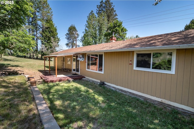 5310 Green Valley Rd, Oakland, OR 97462 - rear view of property with a lawn, roof with shingles, and a patio