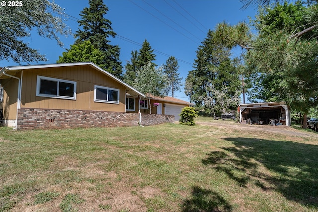 5310 Green Valley Rd, Oakland, OR 97462 - view of grassy yard featuring an attached garage
