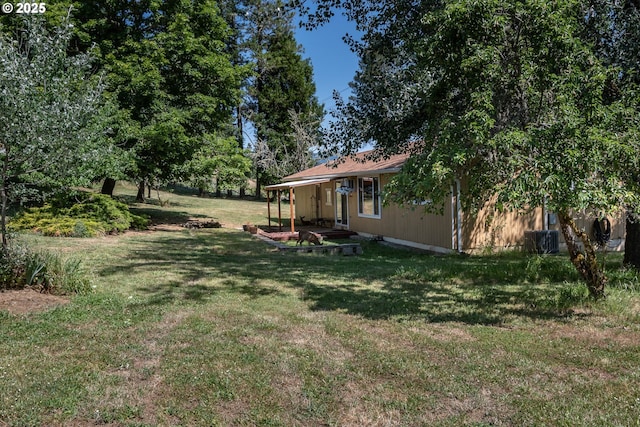 5310 Green Valley Rd, Oakland, OR 97462 - view of grassy yard with a patio area