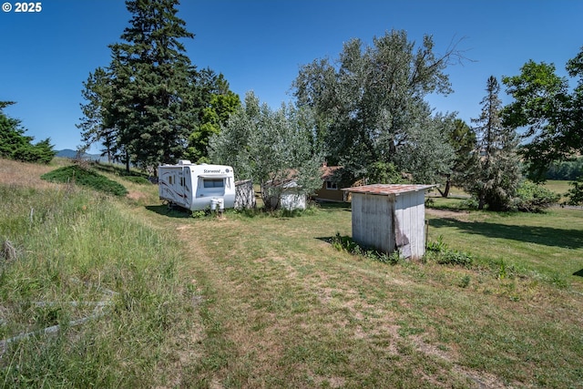 5310 Green Valley Rd, Oakland, OR 97462 - view of green lawn with an outbuilding
