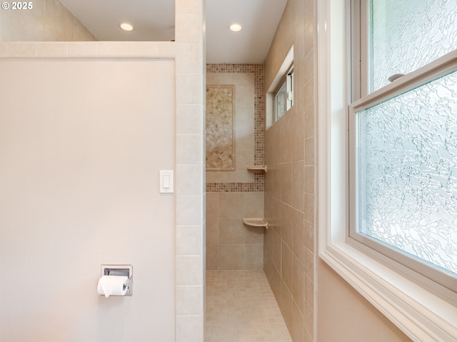 full bathroom with a walk in shower and recessed lighting
