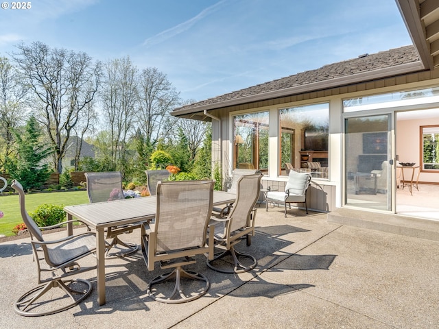 view of patio featuring outdoor dining area