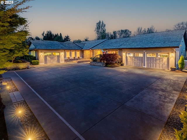 view of front facade with driveway and a garage
