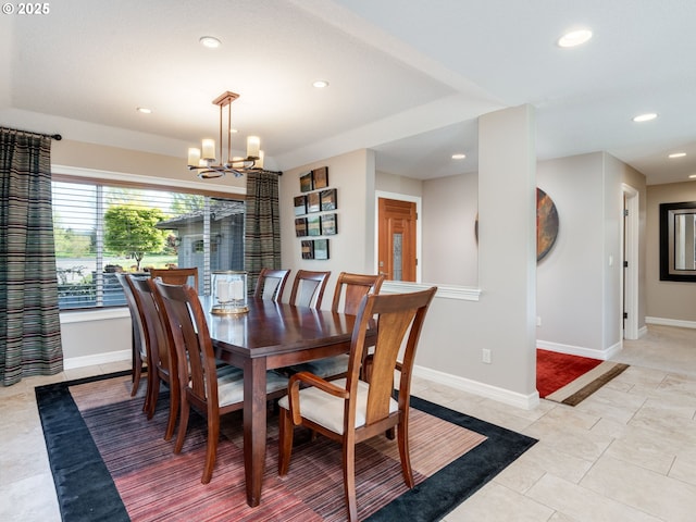 dining area featuring recessed lighting, baseboards, light tile patterned flooring, and a chandelier