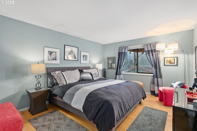 bedroom featuring light hardwood / wood-style flooring