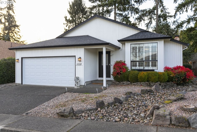 single story home featuring a garage