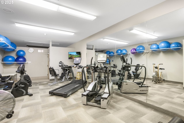 workout area with carpet flooring