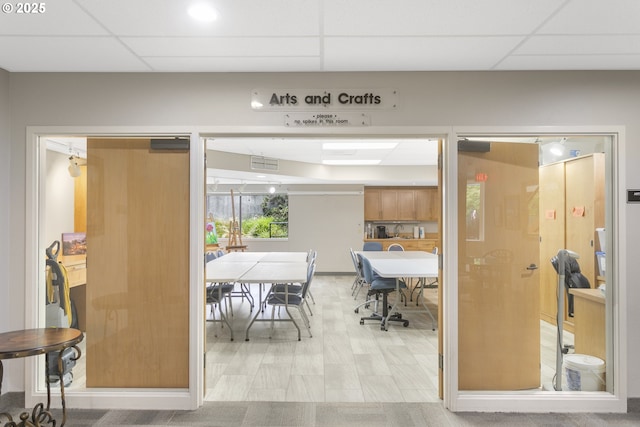 interior space with a drop ceiling