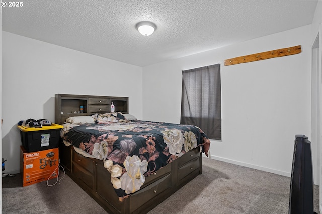 carpeted bedroom featuring a textured ceiling