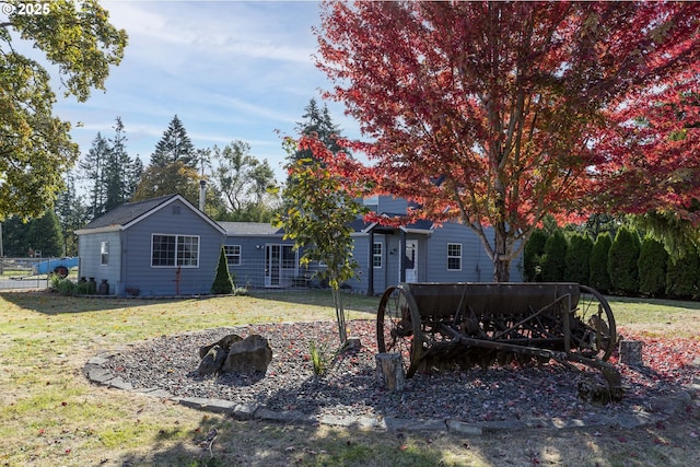 exterior space featuring a front lawn