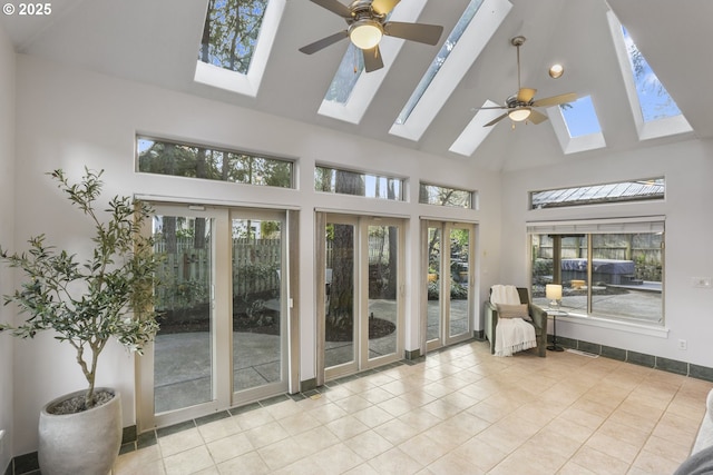 sunroom / solarium featuring vaulted ceiling and ceiling fan