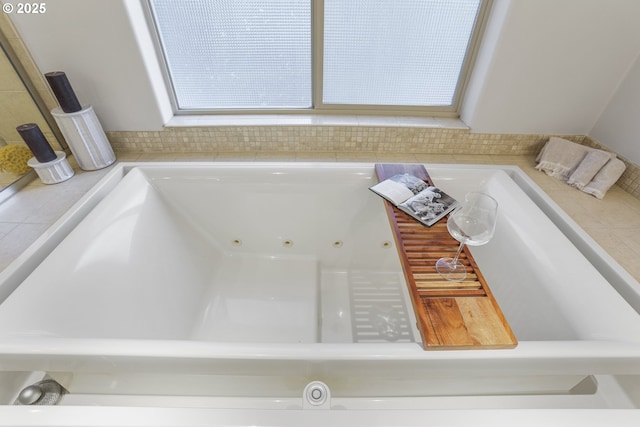 bathroom with a jetted tub