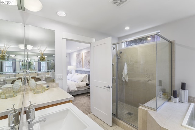 ensuite bathroom featuring a stall shower, tile patterned flooring, visible vents, and a bath