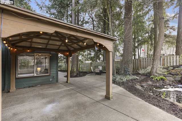 view of patio / terrace with a gazebo and fence