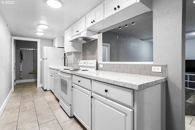 13616 SE Rhine St, Portland, OR 97236 - kitchen featuring white range with electric cooktop, light countertops, backsplash, under cabinet range hood, and white cabinetry