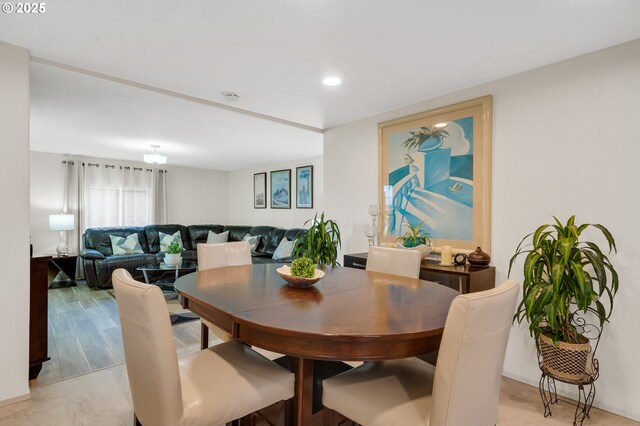 dining space with recessed lighting