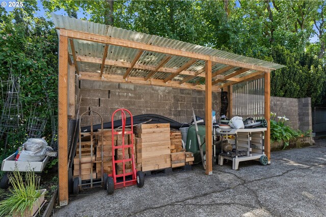 view of patio / terrace featuring a carport