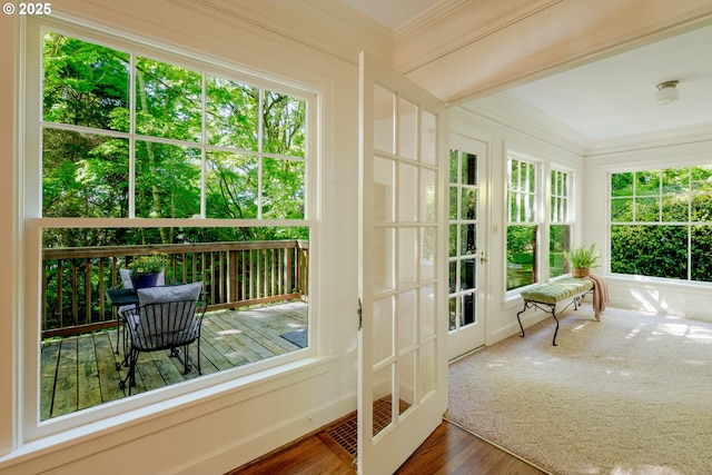 92216 Whiskey Rd, Warrenton, OR 97146 - sunroom / solarium with crown molding, french doors, and wood finished floors