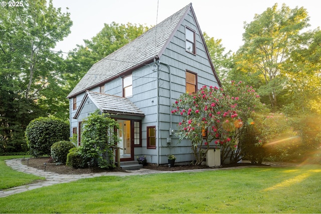 92216 Whiskey Rd, Warrenton, OR 97146 - view of front facade featuring a front lawn