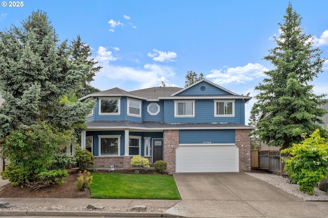 11769 SW 129th Pl, Tigard, OR 97223 - view of front of home featuring brick siding, driveway, and a garage