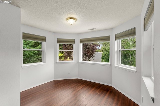 11769 SW 129th Pl, Tigard, OR 97223 - spare room with hardwood / wood-style flooring, baseboards, and a textured ceiling