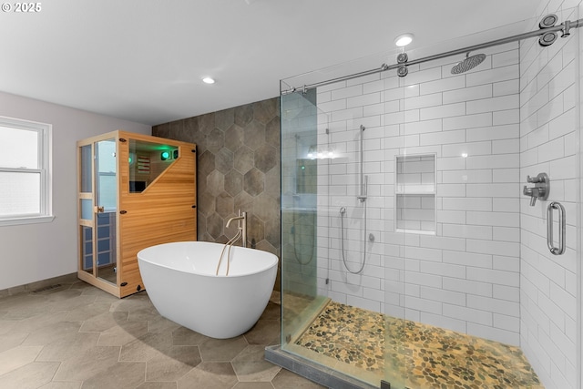 11769 SW 129th Pl, Tigard, OR 97223 - bathroom featuring a stall shower, recessed lighting, a freestanding bath, and baseboards