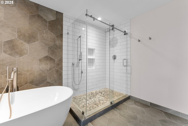 11769 SW 129th Pl, Tigard, OR 97223 - full bathroom with a shower stall, a freestanding tub, and baseboards