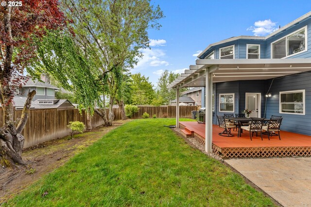 11769 SW 129th Pl, Tigard, OR 97223 - view of yard featuring a deck and outdoor dining area