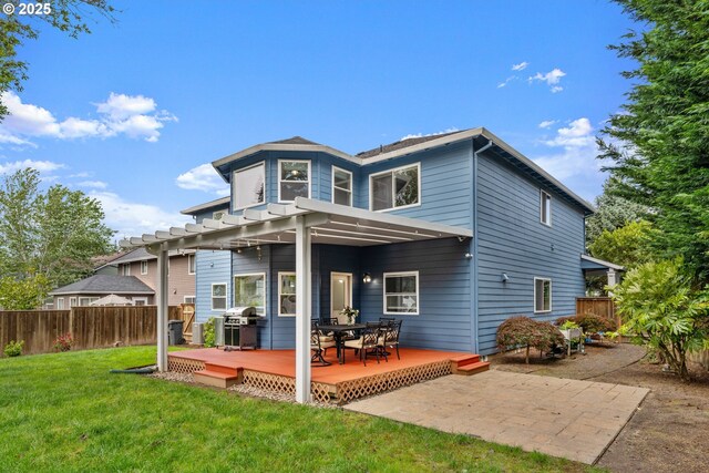 11769 SW 129th Pl, Tigard, OR 97223 - back of house with a wooden deck and a patio