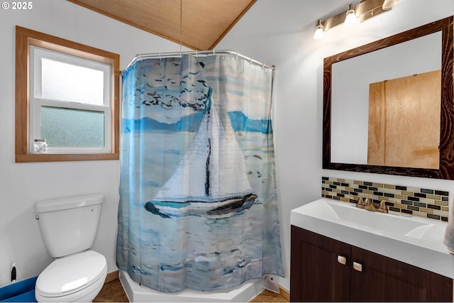 154 NE Tari Ln, Stevenson, WA 98648 - full bathroom featuring vanity, toilet, decorative backsplash, and a shower with shower curtain