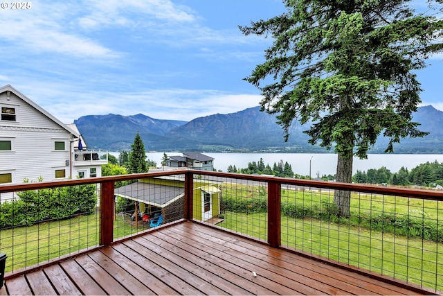 154 NE Tari Ln, Stevenson, WA 98648 - wooden deck with a water and mountain view and a lawn