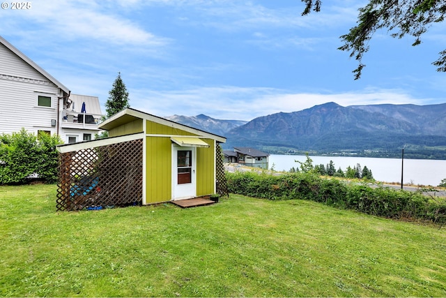 154 NE Tari Ln, Stevenson, WA 98648 - view of green lawn with an outbuilding and a water and mountain view