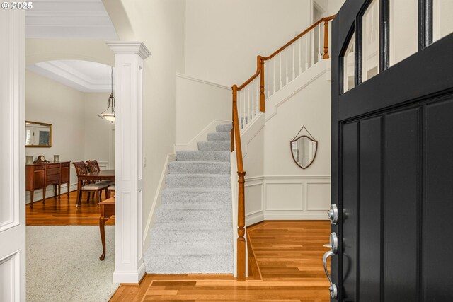 dining space featuring dark hardwood / wood-style flooring and a raised ceiling