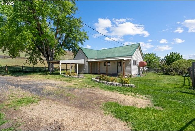 880 Heppner Spray Hwy, Heppner, OR 97836 - back of property with metal roof